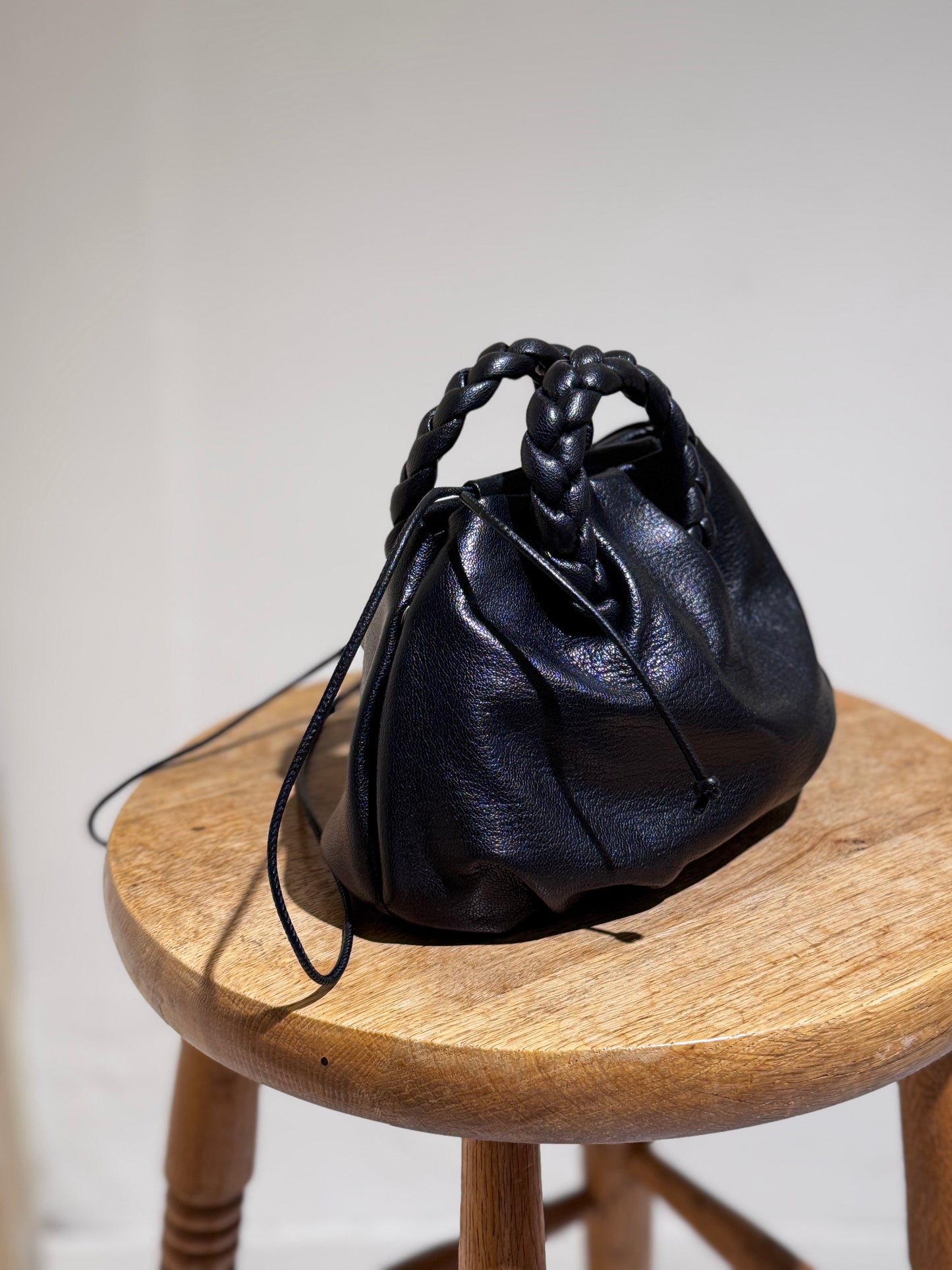W BomBon Metallic Plaited-handle Leather Handbag HEREU - Black